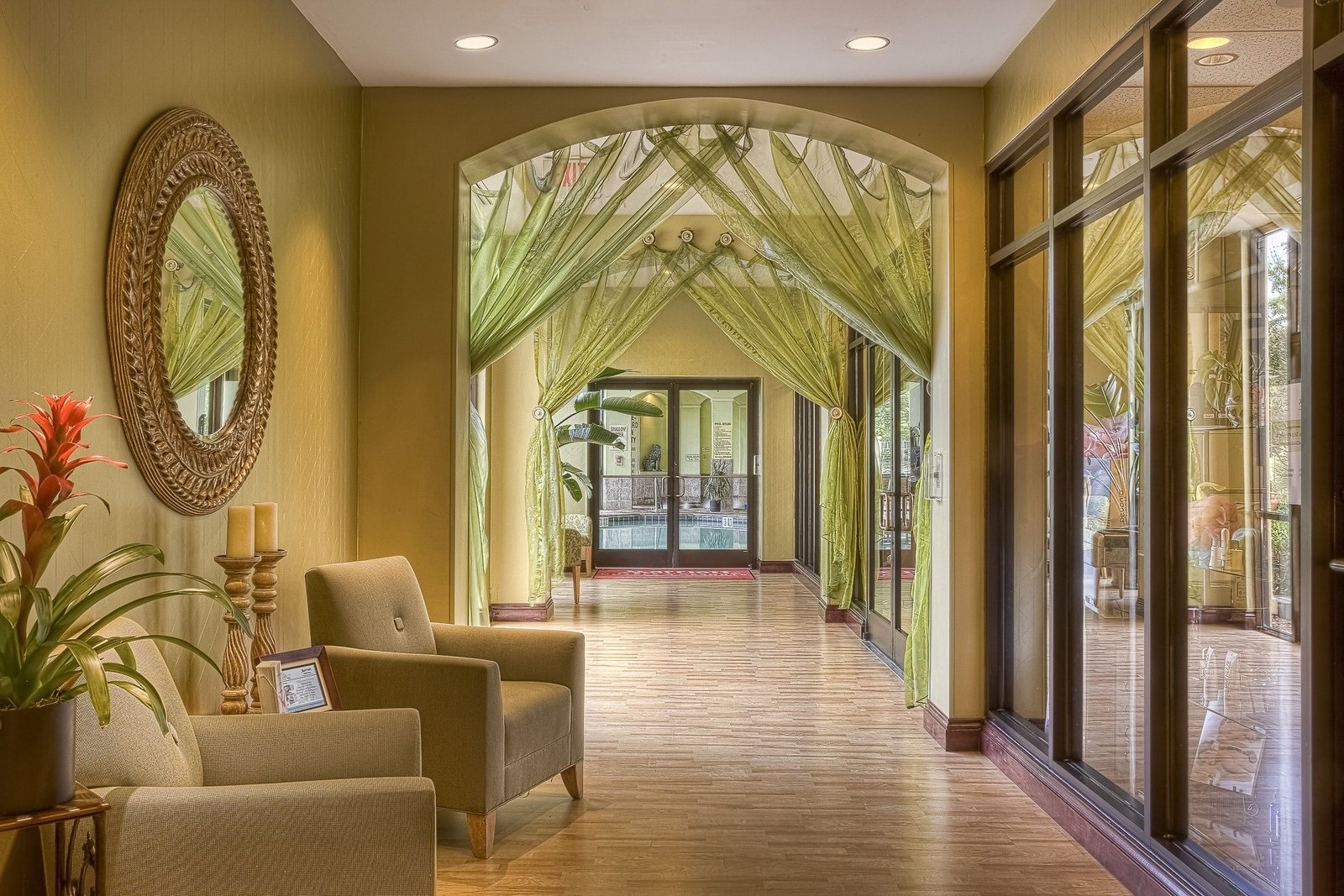 10 Impressive Wall Decorating Ideas For Your Home brown-cushion-armchairs-in-between-brown-frame-round-mirror-53577 brown-cushion-armchairs-in-between-brown-frame-round-mirror-53577 10 Impressive Wall Decorating Ideas For Your Home